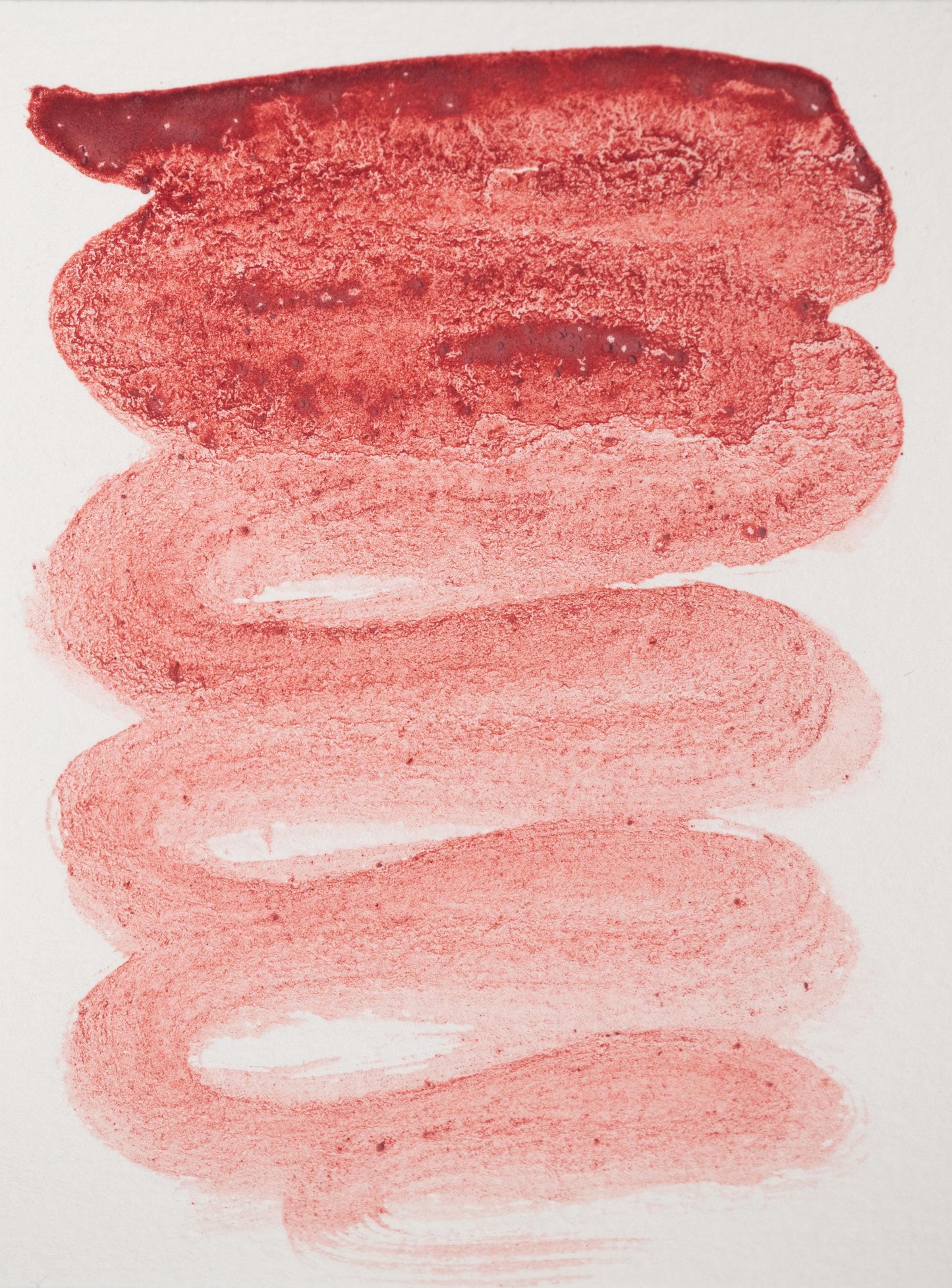 Deep crimson swatch of Madder Red Lake ink with natural variation from brick red to rose pink. Sourced from Rubia tinctorum, this hand-painted botanical gradient highlights its historical use in fine art and manuscript decoration.