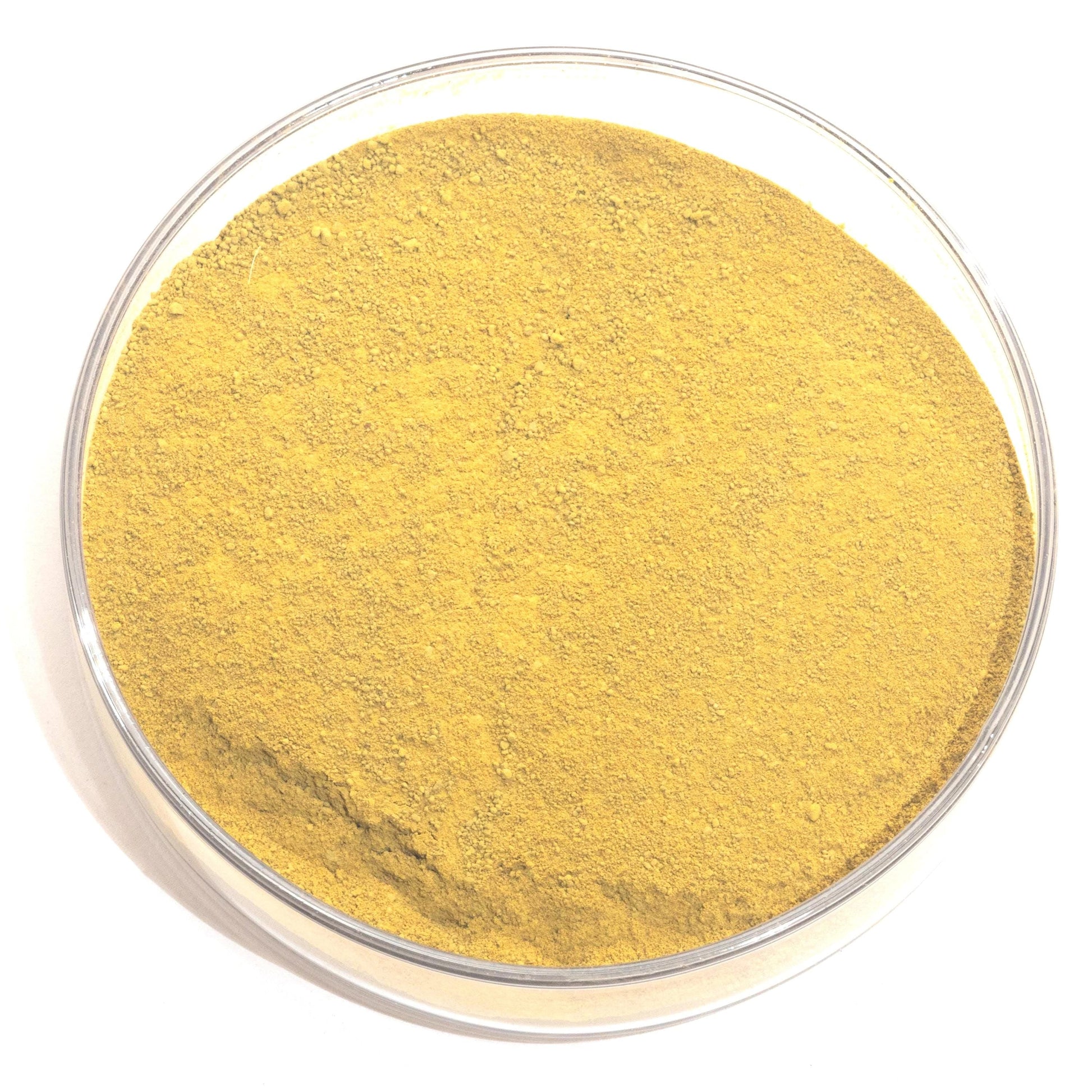 A glass bowl filled with a yellow-colored substance, possibly a powder or granular material.