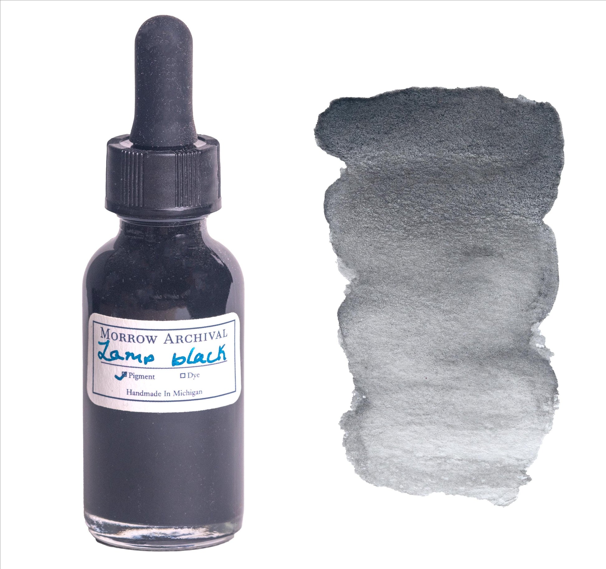 Lamp Black watercolor ink by Morrow Archival, shown in a glass dropper bottle with a deep matte black wash on watercolor paper. Handmade using traditional methods from pure carbon soot, this historic pigment dates back to ancient manuscripts and sumi-e ink painting. Rich in opacity with smooth flow and neutral undertones, it‚Äôs ideal for calligraphy, illustration, and fine art where archival, natural black ink is essential.