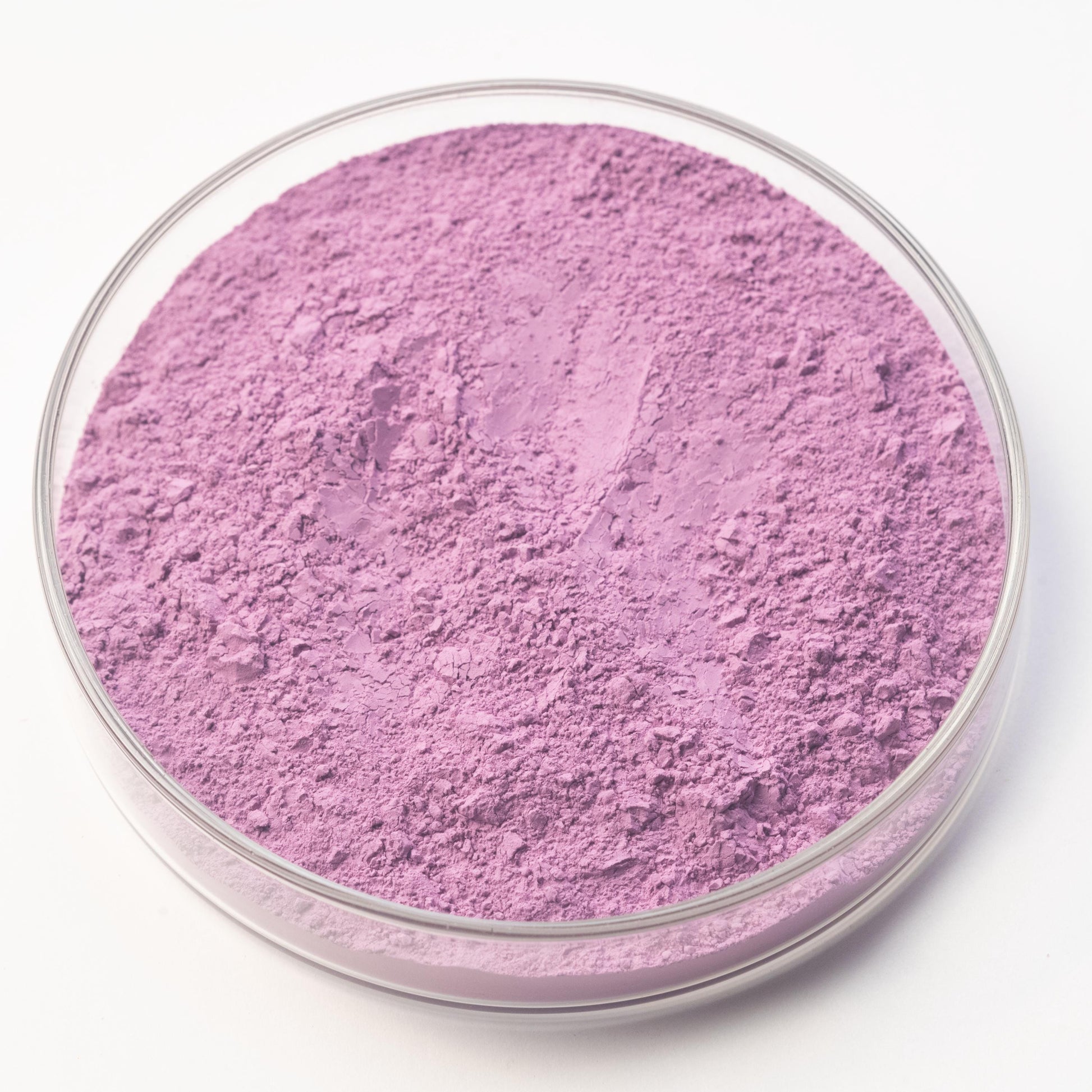 A round glass dish contains bright purple Potter's Violet Pigment, displayed on a plain white background.