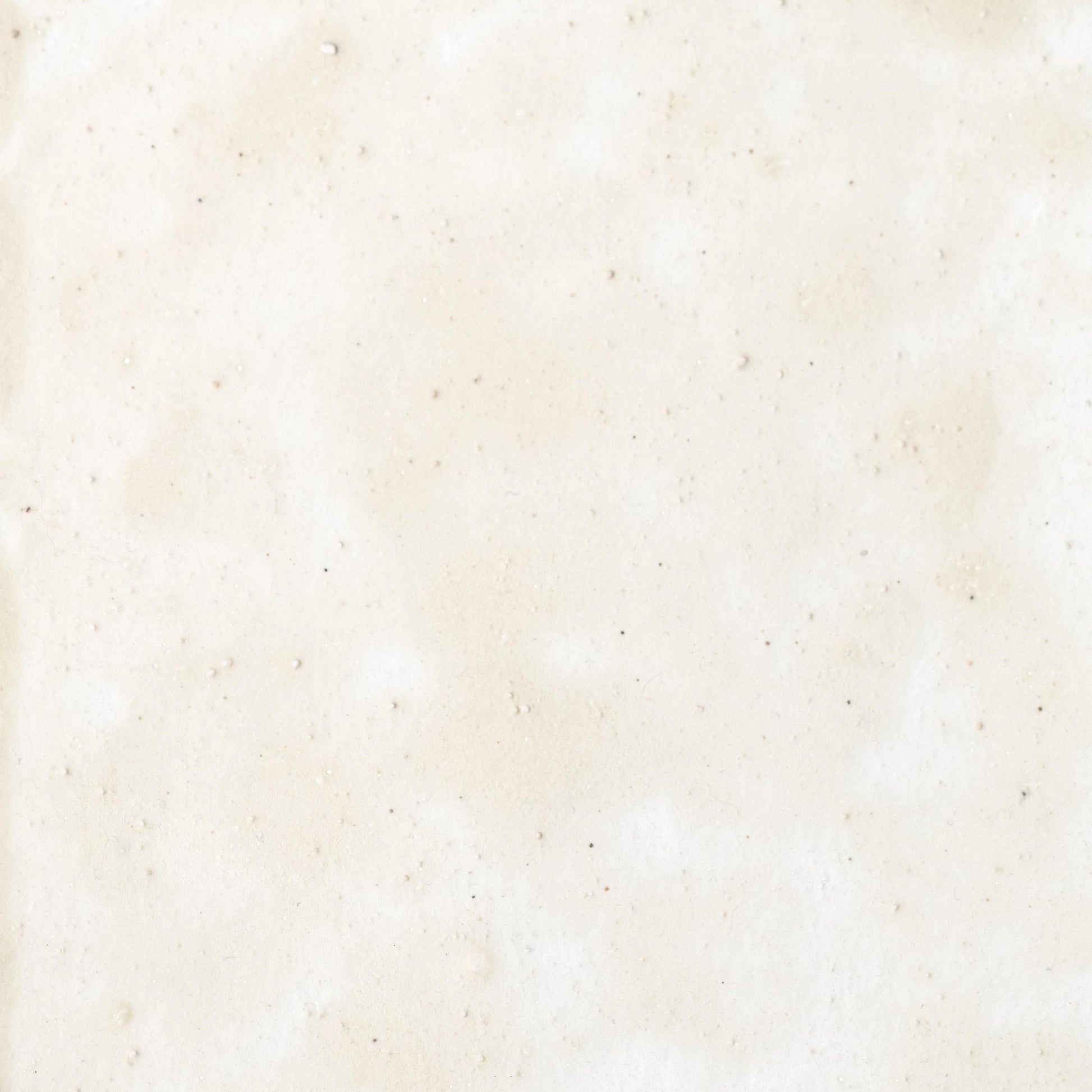 Watercolor painting in soft Bone White, a natural pigment made from ground cuttlefish bone, offering a subtle off-white with slight warmth. Handcrafted using only pigment, honey, and gum arabic for archival, professional-grade quality. Traditional mineral white used in classical and medieval art. Ideal for artists seeking natural, non-toxic whites for mixing, highlights, and historical palettes. Gently granulating watercolor with smooth coverage.