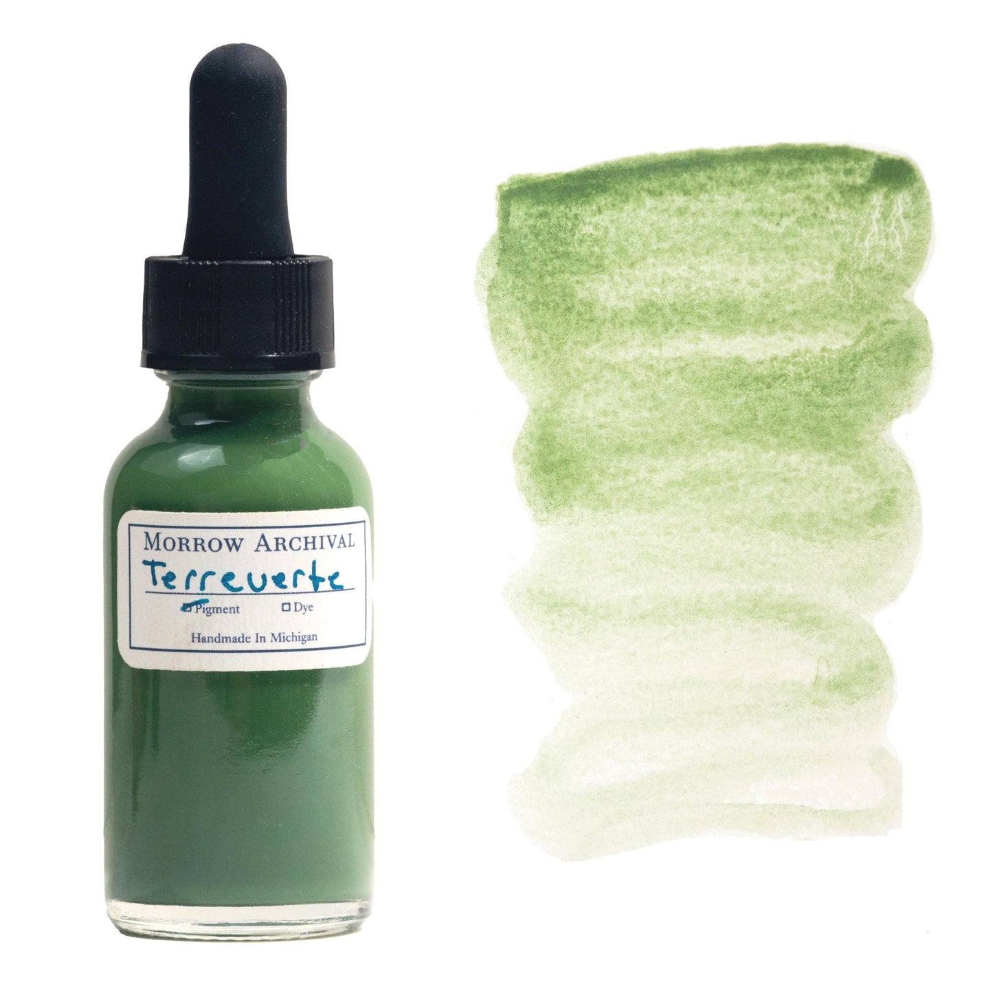 Historical watercolor ink made from natural Terre Verte green earth pigment, bottled in a clear glass dropper bottle with an archival watercolor paper label and hand-painted swatch. This muted, earthy green ink flows smoothly and reveals a soft gradient from cool olive to pale sage. Traditionally used in Renaissance underpaintings and iconography, this archival-quality ink is perfect for historical art, calligraphy, botanical work, and natural pigment collections.