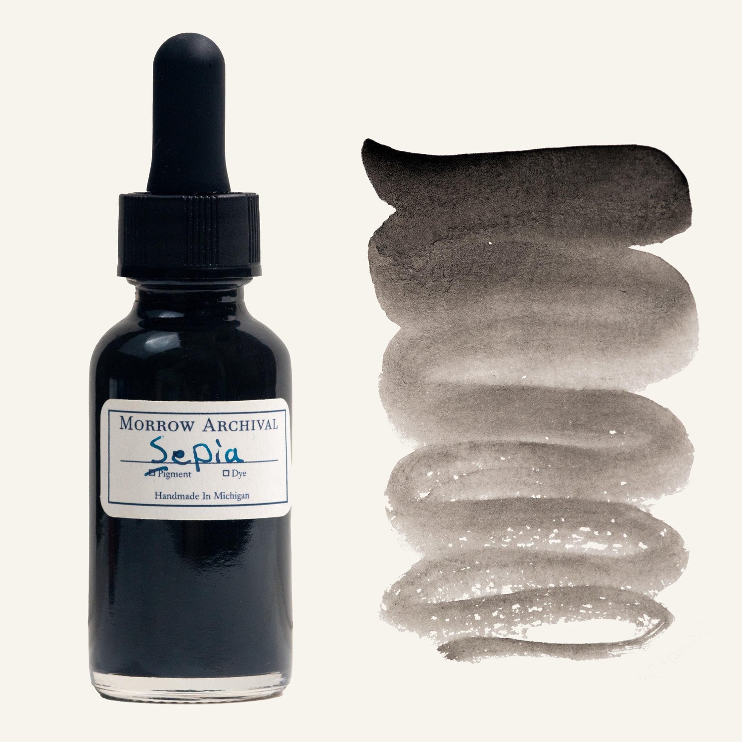 Historical watercolor ink made from natural cuttlefish sepia, presented in a clear glass dropper bottle with a hand-labeled watercolor paper tag and painted swatch. This warm black-brown ink offers rich organic tones with soft transparency and a flowing gradient from deep espresso to a light smoky wash. Traditionally used by classical artists, this archival-quality ink is perfect for calligraphy, ink drawing, and historically inspired artwork with a natural marine origin.