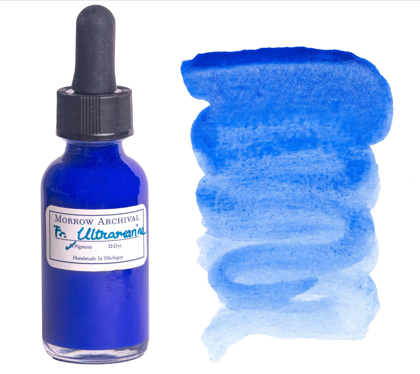 French Ultramarine watercolor ink by Morrow Archival, handmade in small batches with deep, richly pigmented blue tones inspired by historic lapis lazuli. Shown in a glass dropper bottle beside a bold ultramarine wash on watercolor paper. This all-natural, single pigment paint offers vibrant granulation and lightfastness, perfect for fine art, historical work, and gifts for artists who value tradition and quality.