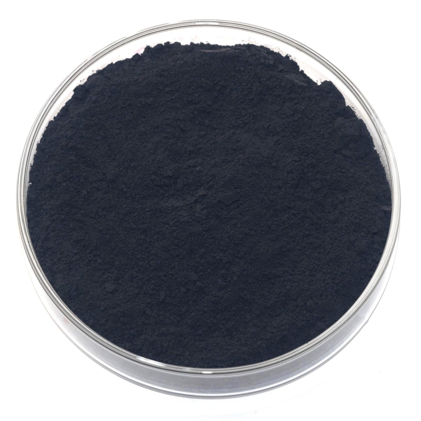 A glass bowl containing a dark, powdery substance, which appears to be a type of black powder or substance.