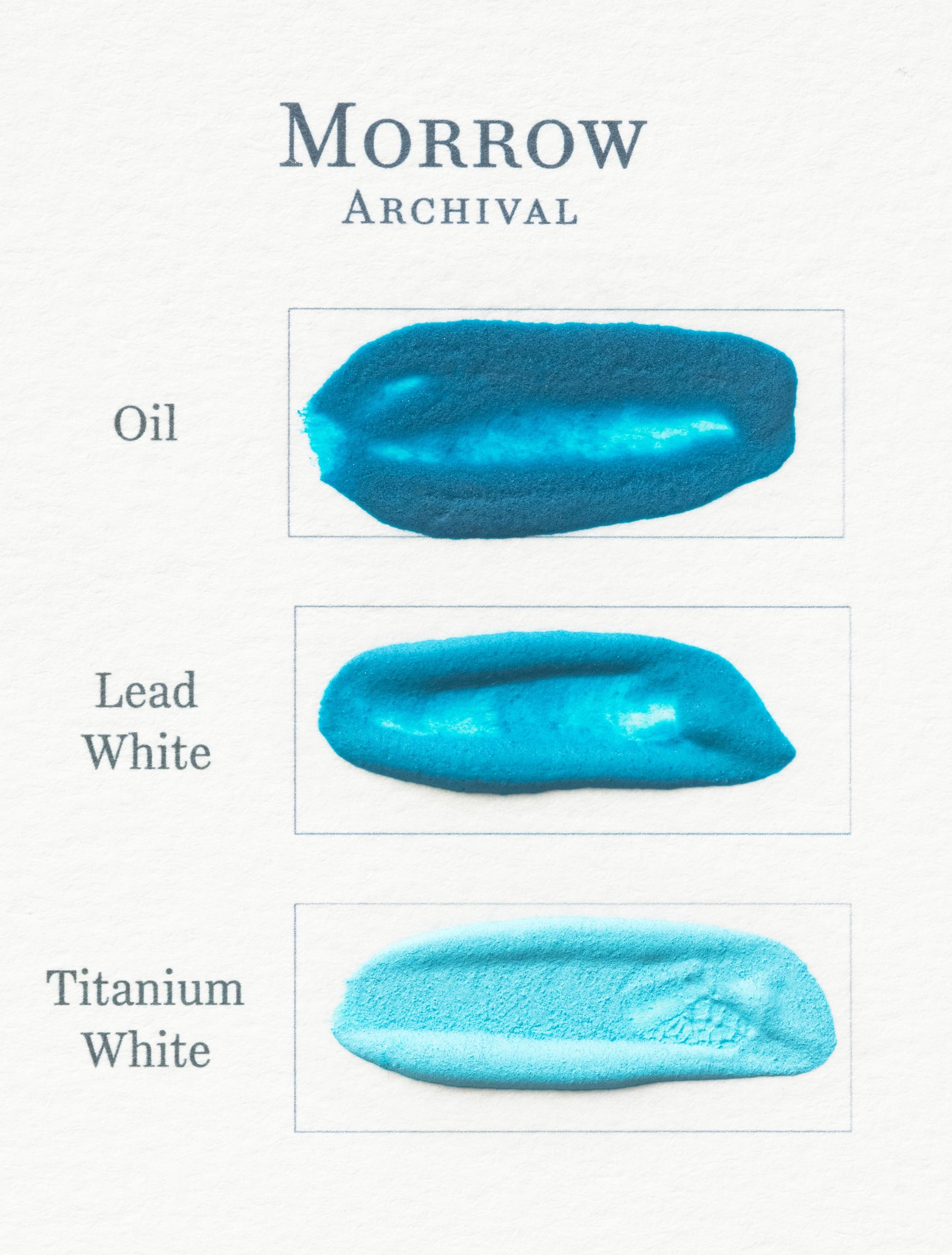 Three swatches of Verdigris Fine Pigment are labeled Oil, Lead White, and Titanium White on textured white paper. The top is a rich verdigris blue, while the others become progressively lighter and more opaque.