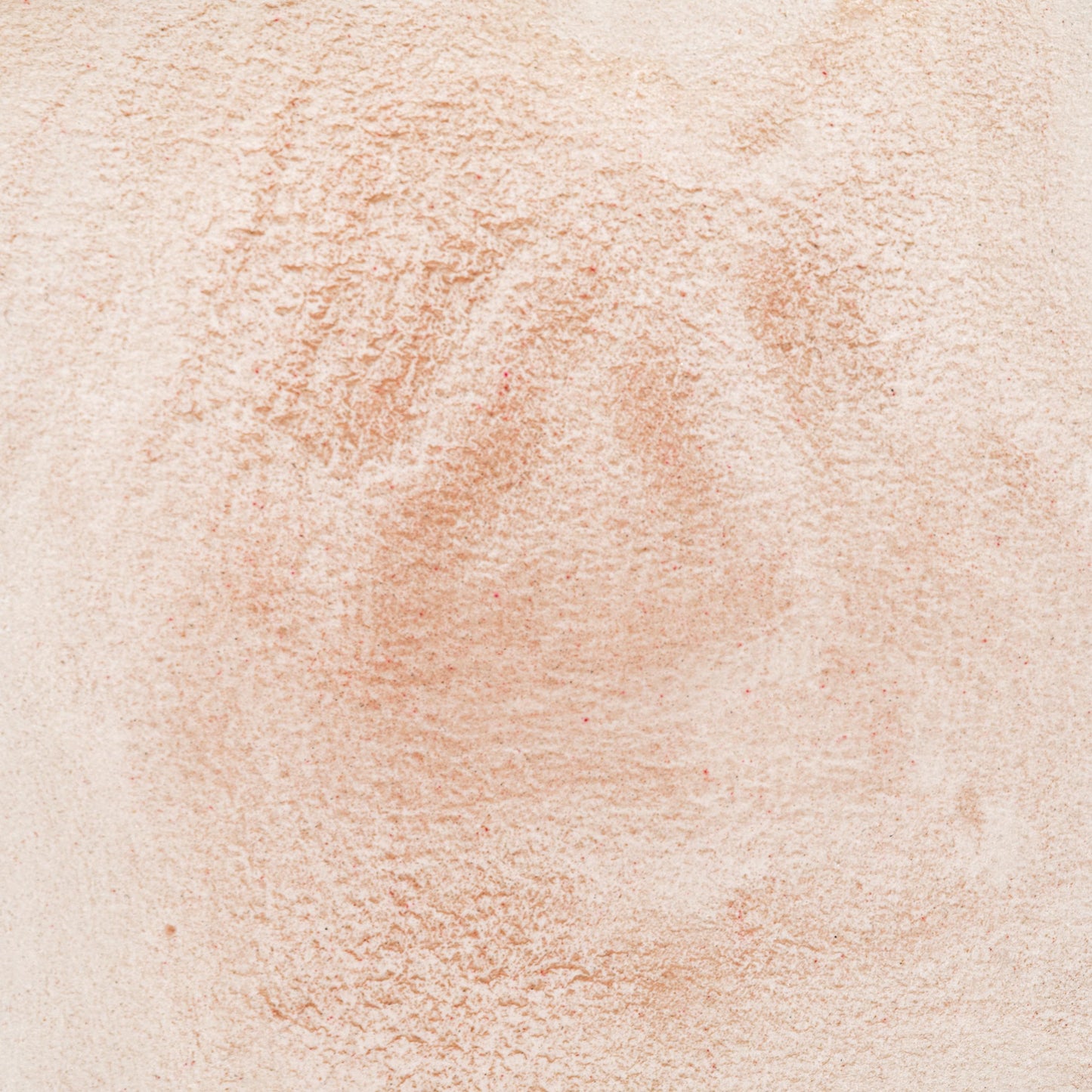 Watercolor swatch in Natural Orange Coral, a rare organic pigment made from sustainably sourced marine coral, prized since antiquity for its radiant orange-red hue and symbolic significance. This handmade watercolor is crafted with honey and gum arabic, offering semi-transparent, moderately lightfast color ideal for classical artwork, sacred palettes, and luminous accents in historical painting.