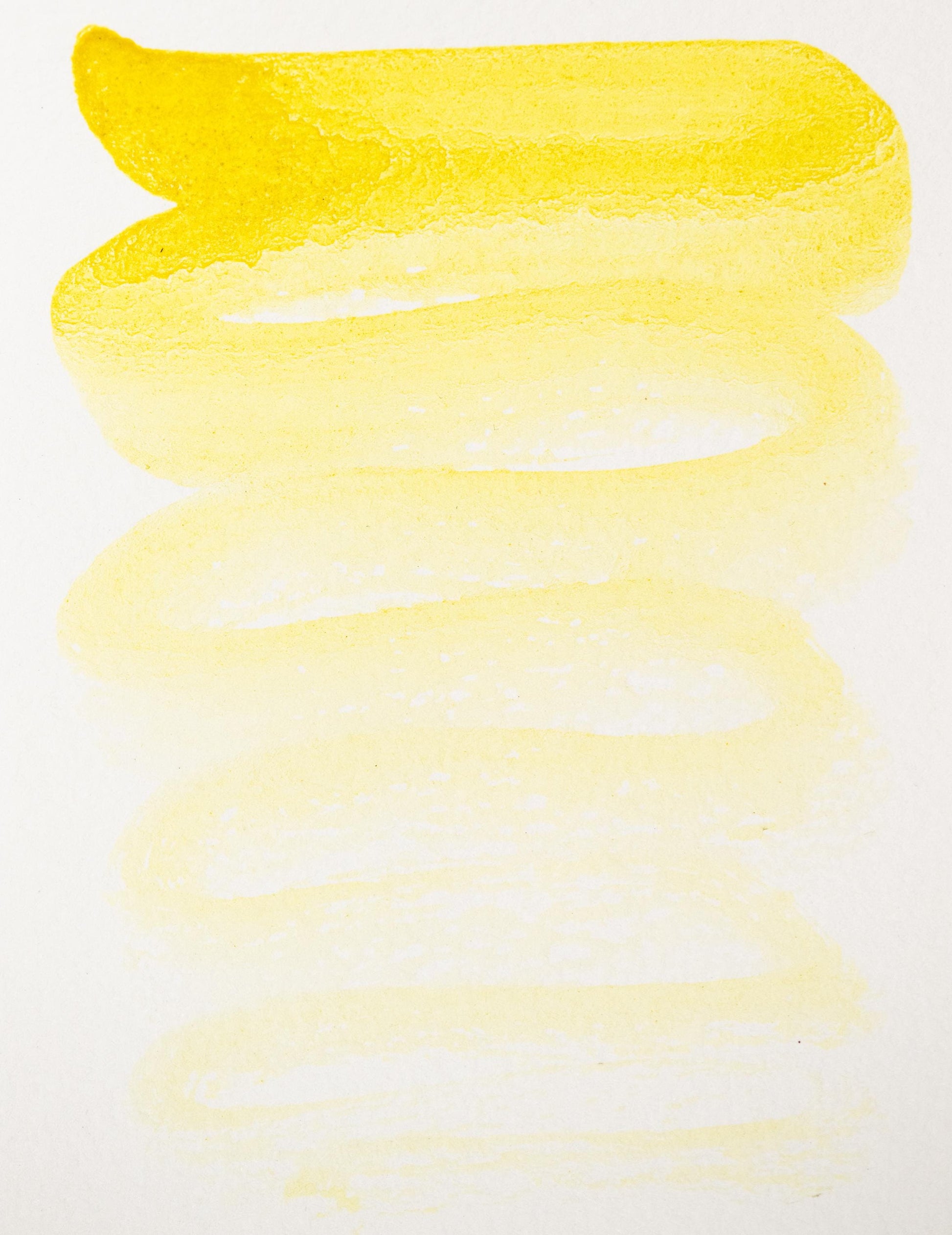 Hand-painted swatch of Arzica Weld Lake ink showing a vibrant lemon-yellow hue with high transparency and a smooth tonal transition. This botanical dye-based color captures the brightness of natural weld, ideal for historical painting and luminous washes in watercolor or calligraphy.