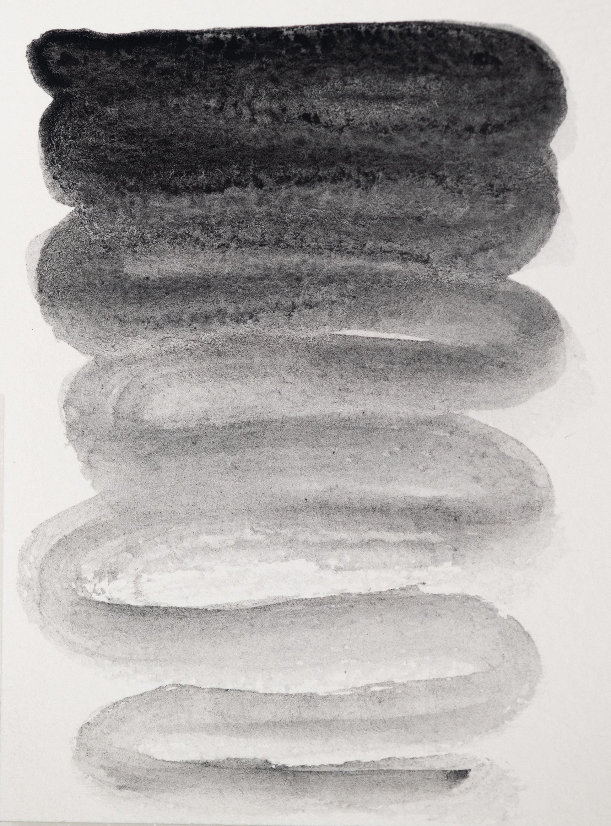 Hand-painted swatch of Vine Black ink revealing a soft gradient from rich charcoal to smoky gray. Made from charred grapevines, this traditional drawing ink creates subtle value shifts perfect for tonal studies and expressive monochrome work.
