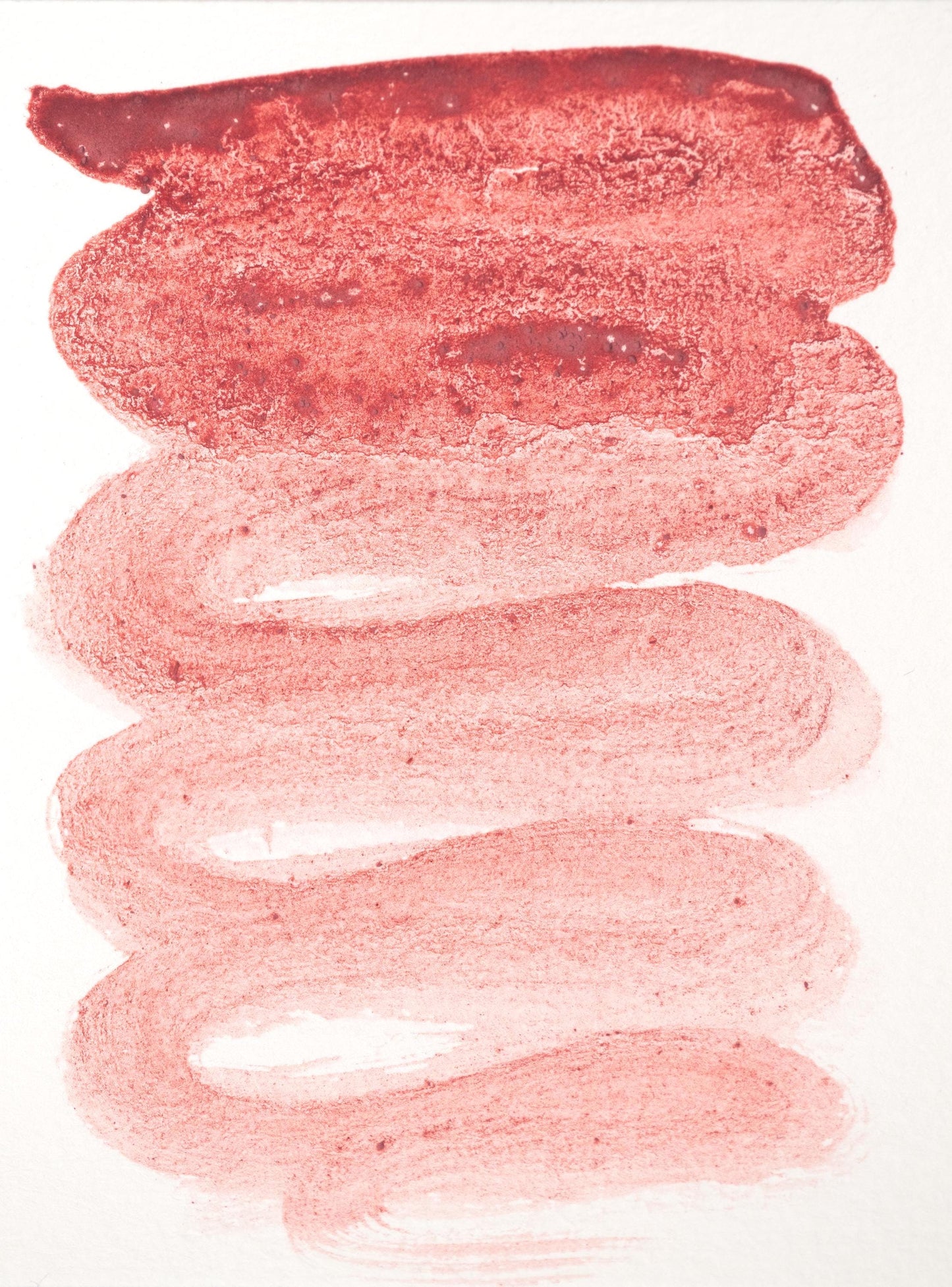 Deep crimson swatch of Madder Red Lake ink with natural variation from brick red to rose pink. Sourced from Rubia tinctorum, this hand-painted botanical gradient highlights its historical use in fine art and manuscript decoration.