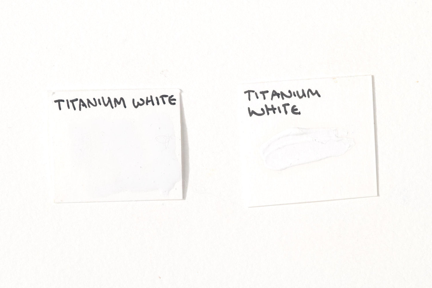 Titanium White pigment tested in watercolor using honey, in oil. The image highlights its intense opacity, bright neutral tone, and strong tinting strength in both watercolor and oil. A highly lightfast and durable pigment, ideal for mixing and creating bold highlights. High-quality Titanium White swatches displayed for comparison.