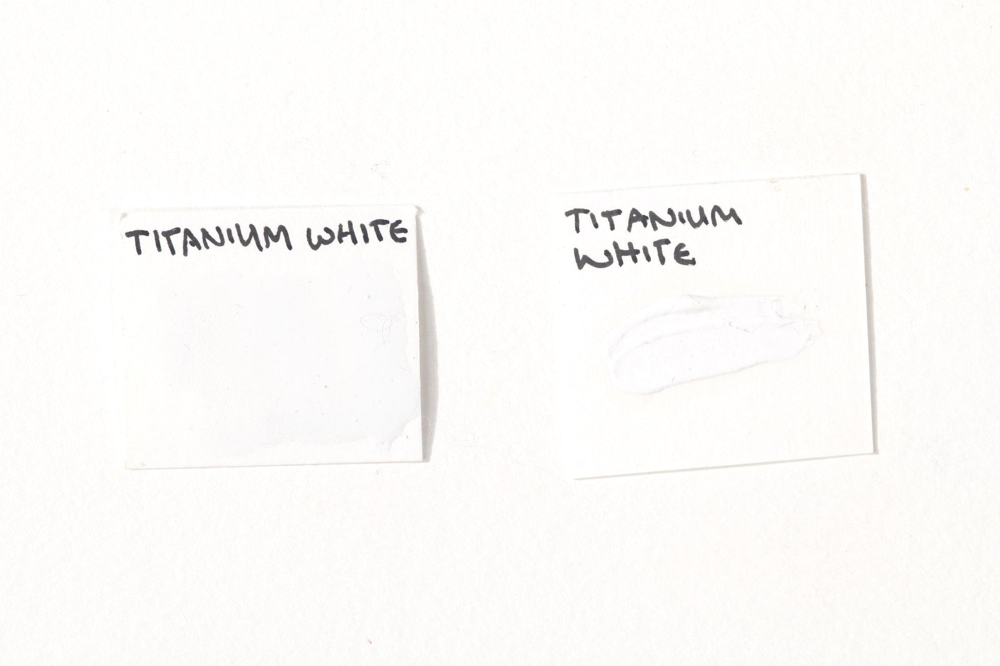 Titanium White pigment tested in watercolor using honey, in oil. The image highlights its intense opacity, bright neutral tone, and strong tinting strength in both watercolor and oil. A highly lightfast and durable pigment, ideal for mixing and creating bold highlights. High-quality Titanium White swatches displayed for comparison.