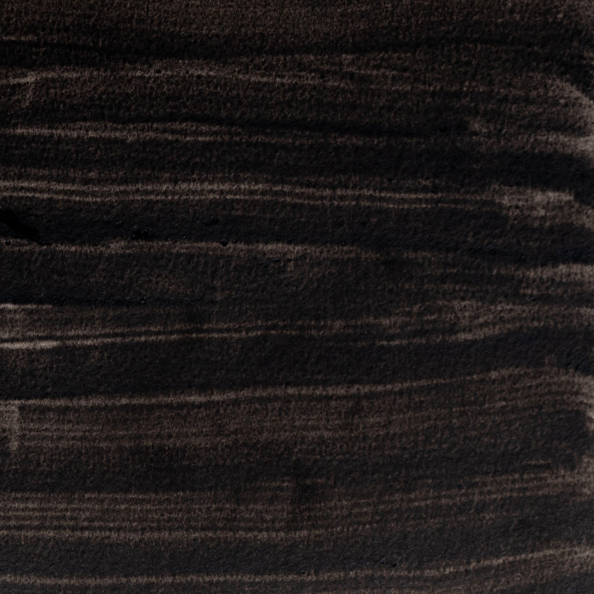 Watercolor painting in deep, matte Roman Black Earth, a natural pigment used in Ancient Roman frescoes and early European painting. Made from charred vegetal or earth sources. Handcrafted with honey and gum arabic. Rich, neutral black perfect for grisaille, historical work, and expressive contrast.
