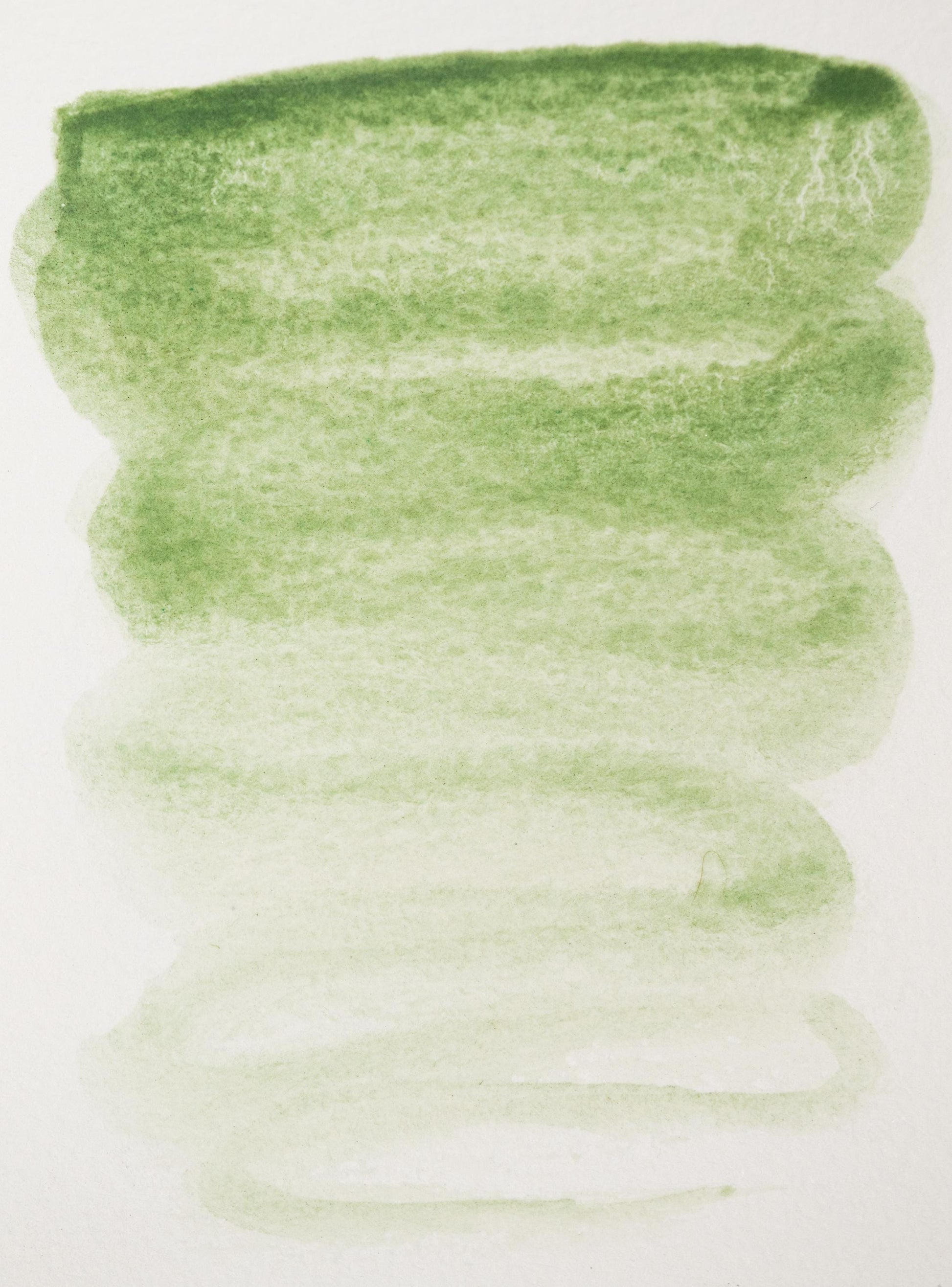 Green earth pigment swatch showing a subtle olive to sage gradient. This traditional Terre Verte ink offers soft coverage and gentle undertones ideal for underpainting, figure work, and historically accurate natural palettes.
