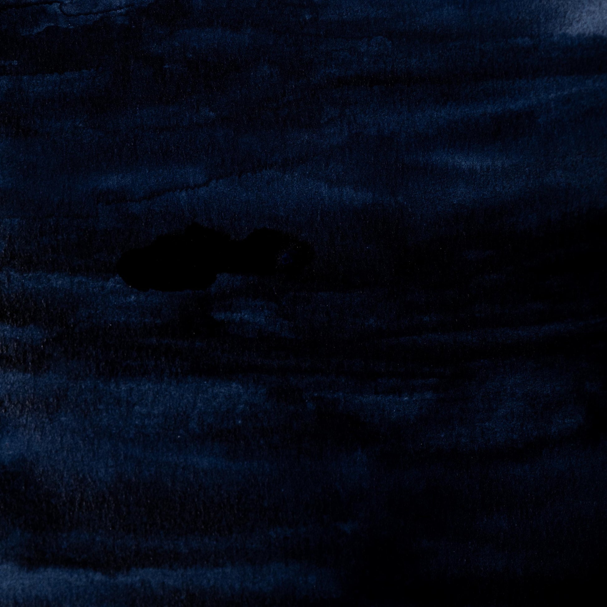 Watercolor painting in deep natural Indigo Pigment, traditionally extracted from the Indigofera tinctoria plant and used globally for centuries. Revered for its rich, cool blue tone. Handcrafted with honey and gum arabic. Transparent and softly granulating, ideal for fabric rendering, historical work, and layered cool tones.