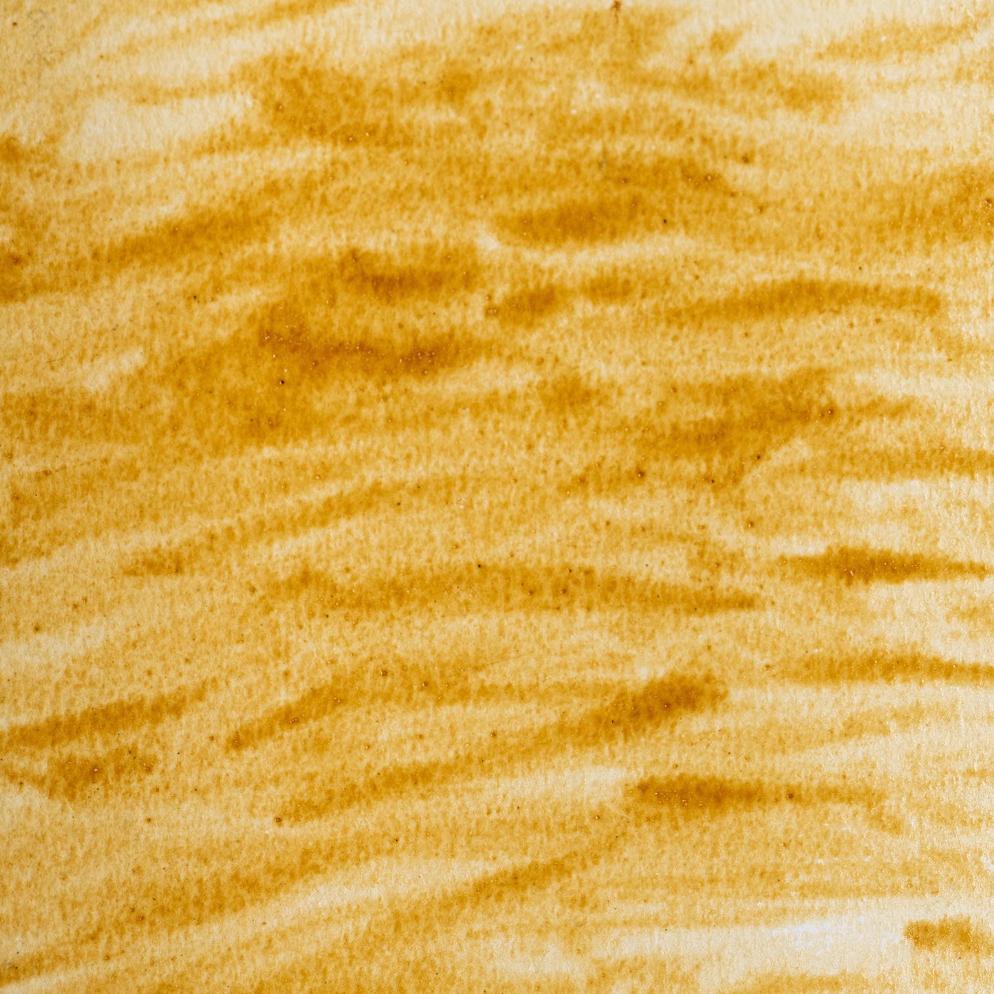 Watercolor painting in soft Light Yellow Ochre, a natural iron oxide pigment mined from ochre-rich regions in France and Italy. Used in cave paintings and classical frescoes. Handcrafted with honey and gum arabic. Earthy, granulating, and highly lightfast. Ideal for landscapes, skin tones, and traditional palettes.