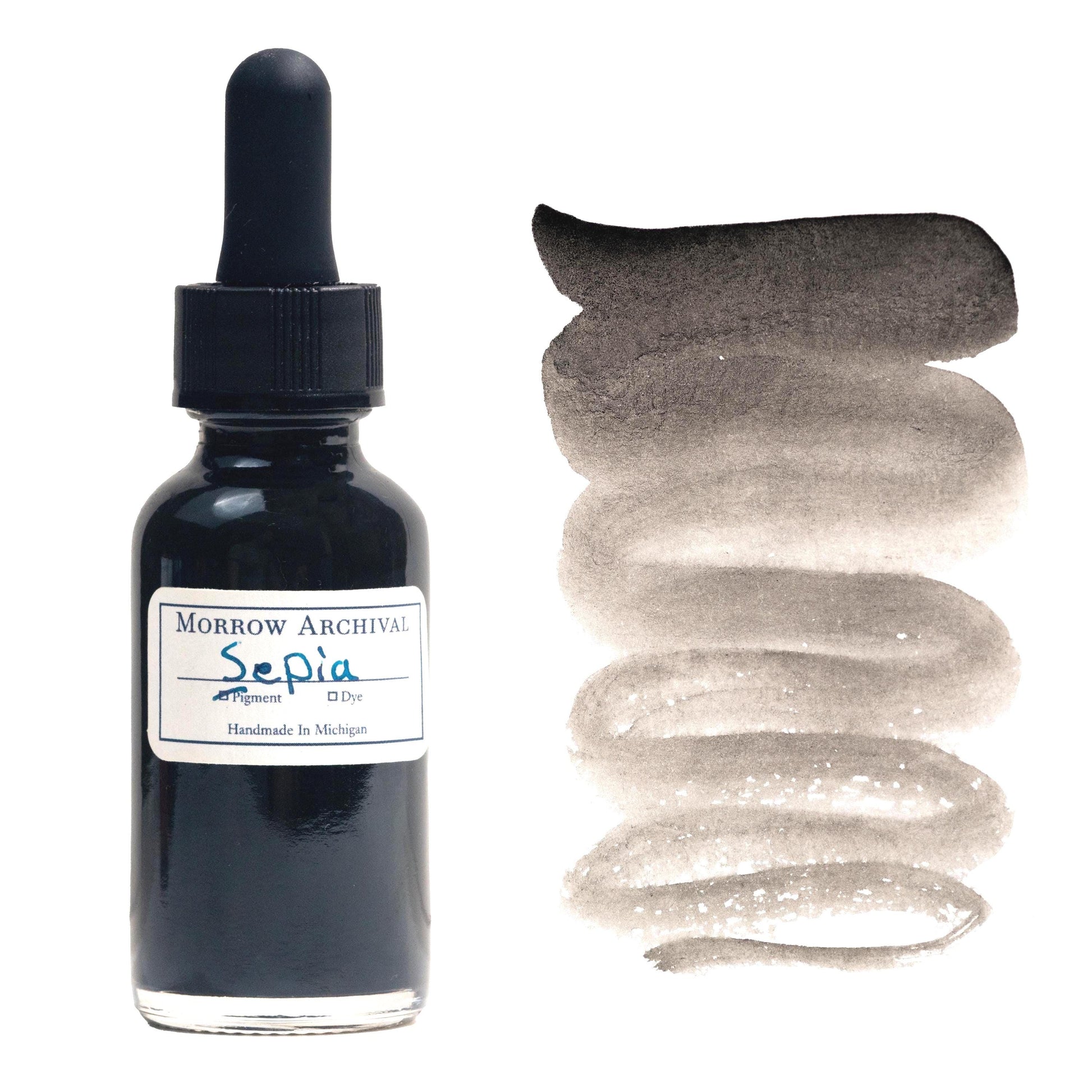 Historical watercolor ink made from natural cuttlefish sepia, presented in a clear glass dropper bottle with a hand-labeled watercolor paper tag and painted swatch. This warm black-brown ink offers rich organic tones with soft transparency and a flowing gradient from deep espresso to a light smoky wash. Traditionally used by classical artists, this archival-quality ink is perfect for calligraphy, ink drawing, and historically inspired artwork with a natural marine origin.