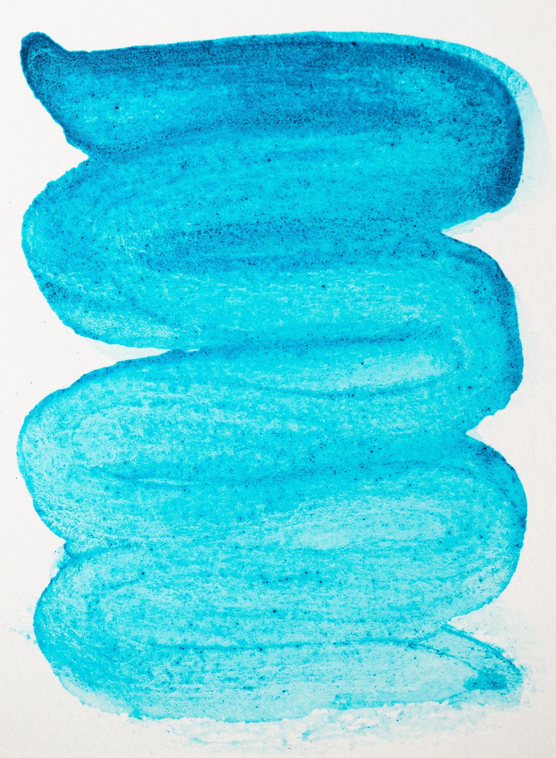 Vibrant turquoise-green swatch of Verdigris ink showing a transition from seafoam to rich teal. Made from copper acetate, this historic ink delivers bold yet translucent color with a faint metallic quality used in medieval and Renaissance art.